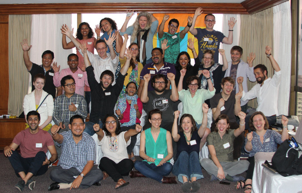 A smiling group of people excited to responsibly document human rights violations